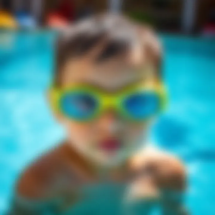 Child wearing swimming goggles at a pool